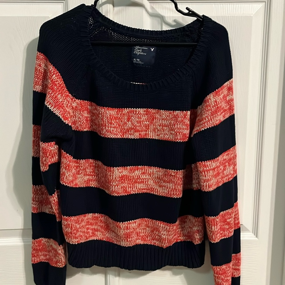 Women’s lightly worn blue, red, and white cardigan sweater